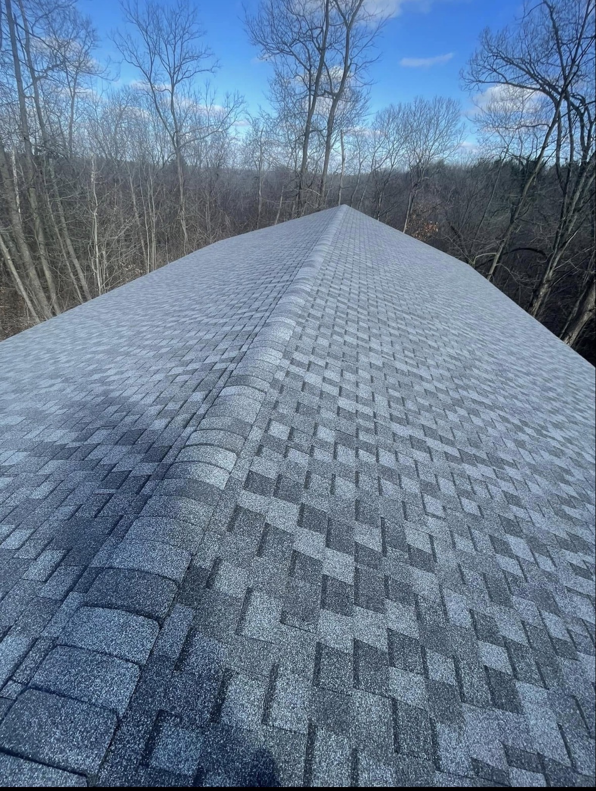 The same roof finished in architectural shingle